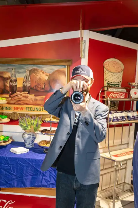 A photographer at work during the grand opening at Picker Joe's Antique Mall in Savannah, GA