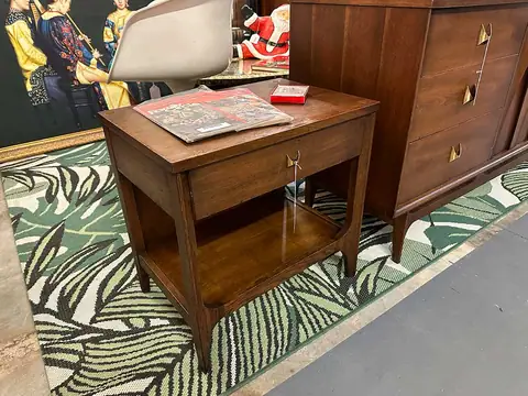 Walnut nightstand and dresser on a palm-leaf rug at Picker Joe's Antique Mall in Savannah, GA