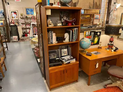 Walnut bookcase and a mid-century desk at Picker Joe's Antique Mall in Savannah, GA