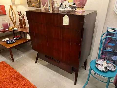 Tall dark walnut highboy dresser at Picker Joe's Antique Mall in Savannah, GA