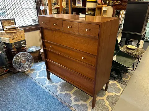 Walnut tall dresser on a gray trellis rug at Picker Joe's Antique Mall in Savannah, GA