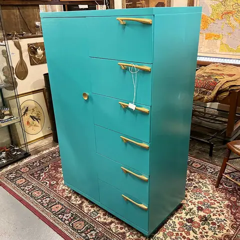 Teal mid-century tall chest with brass pulls at Picker Joe's Antique Mall in Savannah, GA