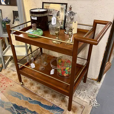 Walnut and brass bar cart with glassware at Picker Joe's Antique Mall in Savannah, GA