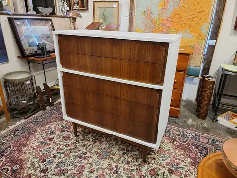 Mid-century chest with a white frame and wood drawers at Picker Joe's Antique Mall in Savannah, GA