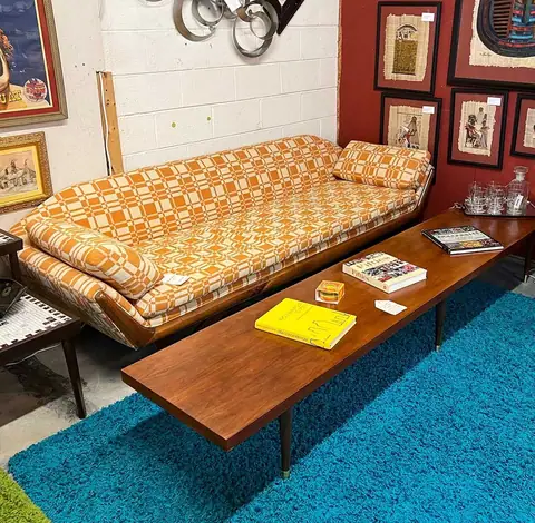 Mid-century sofa with a long coffee table at Picker Joe's Antique Mall in Savannah, GA