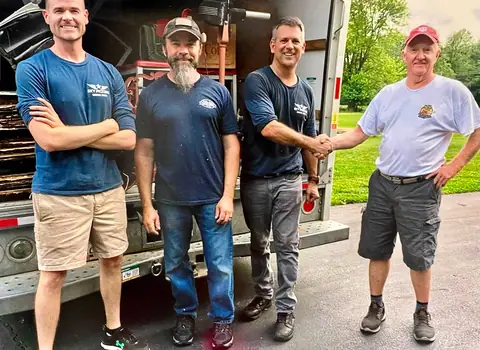 Sky Pickers team with a delivery truck at Picker Joe's Antique Mall in Savannah, GA