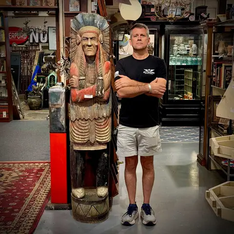 A carved wooden cigar store figure in the store at Picker Joe's Antique Mall in Savannah, GA