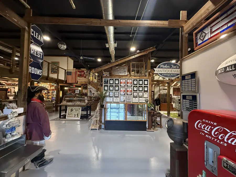 Main aisle with a vintage Coca-Cola cooler at Picker Joe's Antique Mall in Savannah, GA